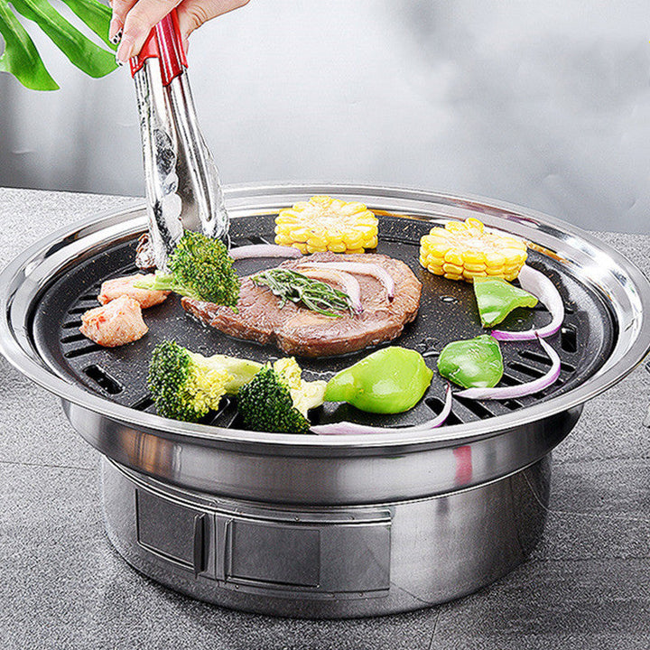 Experience the Joy of Cooking with the Portable Round Stainless Steel Charcoal Korean BBQ Grill