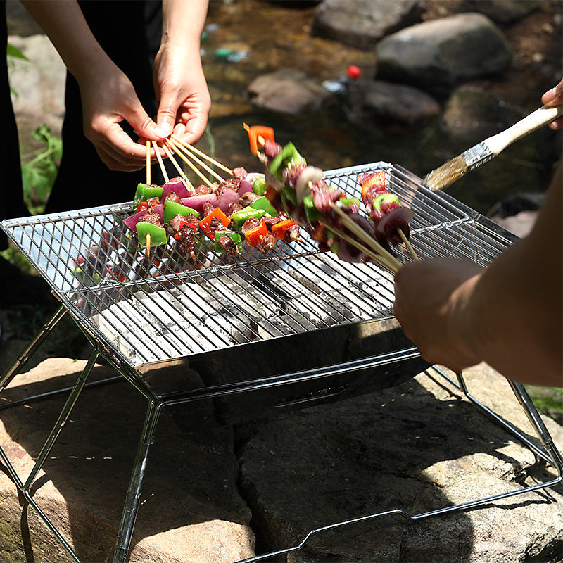 Experience the Joy of Outdoor Cooking with the Portable Foldable Medium Grill